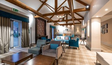 Image shows the lounge and bar area of The Barn Hotel, a luxury hotel in Grantham.