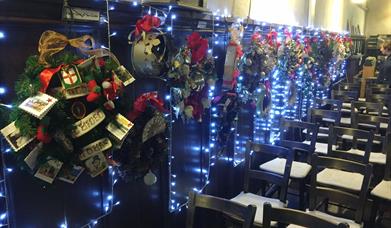 Image shows a picture of a variety of wreaths.