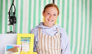 Image shows a trader at the Teenage Christmas Market.