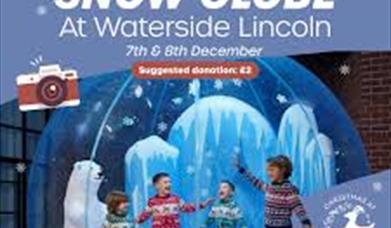 Giant Snow Globe with children playing inside